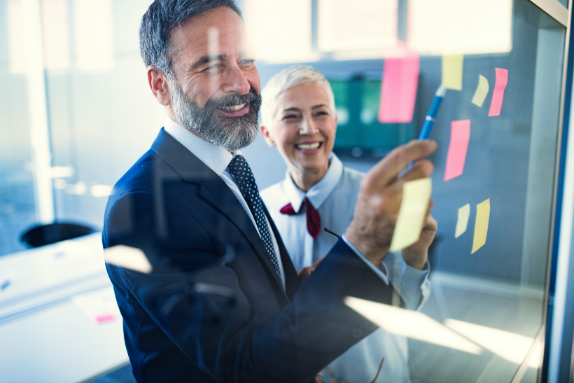 senior-business-accountants-working-together-at-mo-U8K4H7N